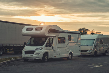 sunrise with campervan mobile home campervan fuels in gas station for an outdoor nomad lifestyle camper van caravan vehicle for van life holiday on motor home journey camping in the parking