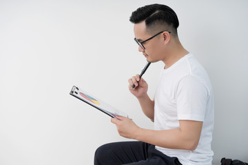 Home office scene of young Asian men