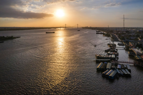 Aerial view of sunset over Mekong river, area of My Tho city, Tien Giang, Vietnam. Mekong Delta. Near Ben Tre