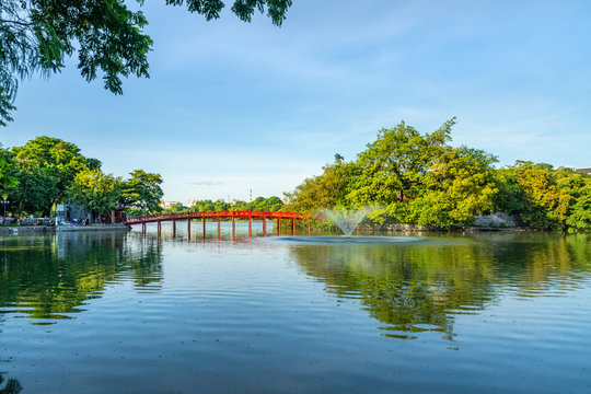 The Huc bridge (red bridge), entrance of Ngoc Son temple on Hoan Kiem lake, Hanoi, Vietnam