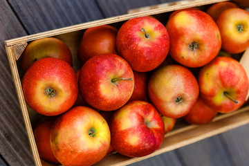 red apples in a wooden box, healthy food