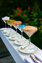 cocktail glasses with powder for ice cream, catering for a holiday