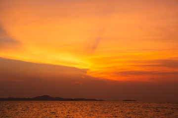 The islands with the reflection of the orange sky.