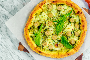 Italian pizza with mozzarella and basil