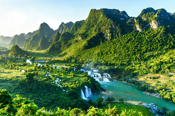 Fototapeta na wymiar Royalty high quality free stock image aerial view of “ Ban Gioc “ waterfall, Cao Bang, Vietnam. “ Ban Gioc “ waterfall is one of the top 10 waterfalls in the world. Aerial view.