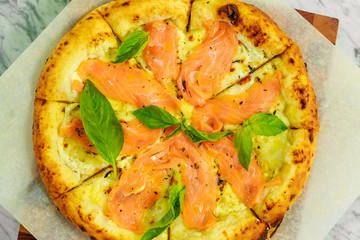 Italian pizza with mozzarella and basil