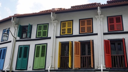 colorful wooden window shutters in singapore