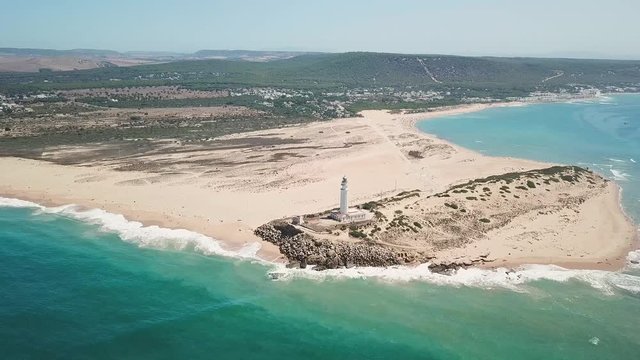 Aerial view of Cape Trafalgar lighthouse,  Cadiz, south-west of Spain. Atlantic Ocean, northwest of the Strait of Gibraltar. In 1805 naval Battle of Trafalgar took place here