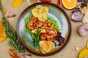 Autumn table setting with pumpkins. Thanksgiving dinner. beer shrimp with homemade potato chips
