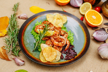 Autumn table setting with pumpkins. Thanksgiving dinner. beer shrimp with homemade potato chips