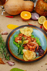 Autumn table setting with pumpkins. Thanksgiving dinner. beer shrimp with homemade potato chips