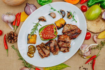 Autumn table setting with pumpkins. Thanksgiving dinner.grilled meat with vegetables