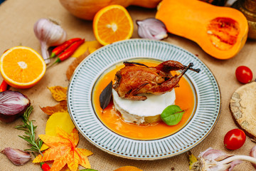 Autumn table setting with pumpkins. Thanksgiving dinner.Hosper Chicken with BBQ Sauce