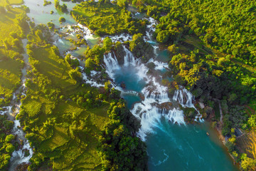 Naklejka na ściany i meble Royalty high quality free stock image aerial view of “ Ban Gioc “ waterfall, Cao Bang, Vietnam. “ Ban Gioc “ waterfall is one of the top 10 waterfalls in the world. Aerial view