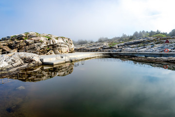Stairs access to scenic Sjobadet Myklebust public sea swimming pool in Tananger, Norway, May 2018
