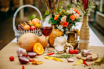 Autumn table setting with pumpkins and leaves. Thanksgiving dinner.