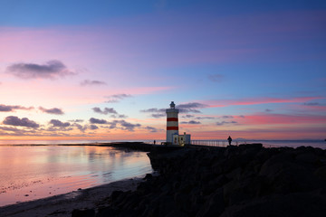 Fototapeta na wymiar lighthouse at sunset in Iceland 