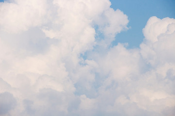 Bright blue sky with white clouds for background or wallpapers