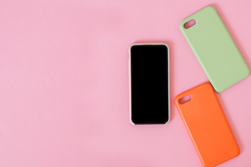 Top view of a smartphone with silicone cases.