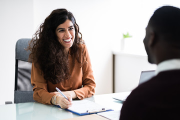 Female Manager Interviewing A Male Applicant