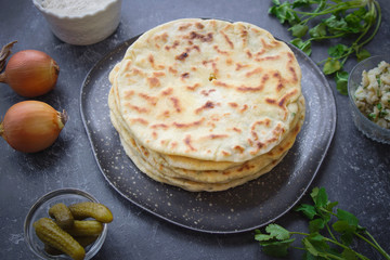 Khychin, Tortilla, Traditional Balkar food, Ossetian pie, Dark background