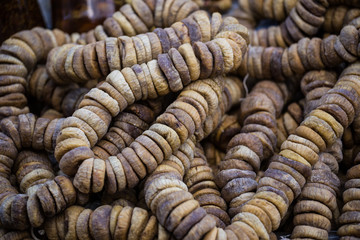 Bunches of dried figs on a Turkish market counter.