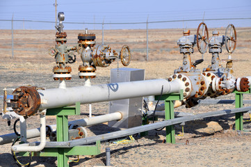 The oil production manifold at the wellsite