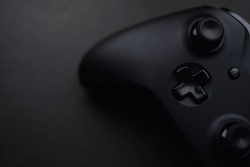 gamepad, modern game controller on dark background © nexusby