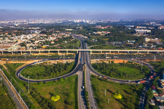Top view aerial of " Tram 2 " overpass, intersection of 1A national road with Hanoi highway. Ho Chi Minh City, Vietnam. View from district 9 to Thu Duc district 