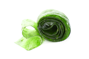 Obraz premium fruit pastille from gooseberries or kiwi, dried fruit and berry puree sheets. Organic food. Natural products.