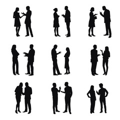 Silhouette Of Two People Discussing