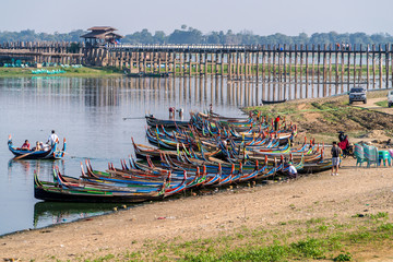 Fototapeta na wymiar Royalty high quality free stock image of silhouettes of people and Bridge U-Bein teak bridge is the longest. in Amarapura ,Mandalay ,Myanmar