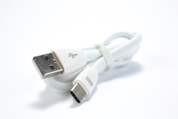 Guitar audio jack with black cable isolated on white background