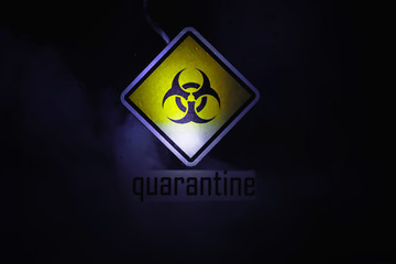 Quarantine. Quarantine warning sign on a glass door in a hospital isolator. Isolation of patients with the virus in special laboratories. Virus.