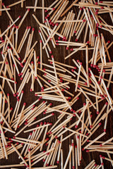 Spattered matches on a wooden table