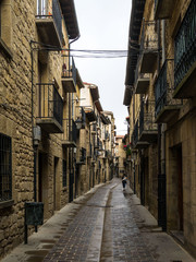 View of a narrow street in the old town of Laguardia, Rioja Alavesa, Basque Country, Spain