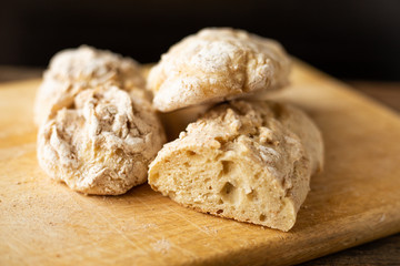 Freshly baked homemade bread served on a wooden cutting board