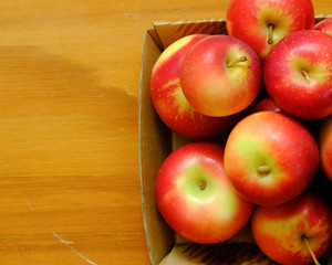 New Zealand apple on wooden background