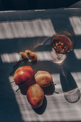 
Apples, pear and white wine on a table