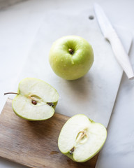 Green Apple on marble background
