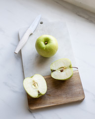 Green Apple on marble background