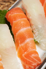 Salmon sushi, Japanese raw fish and rice dish 