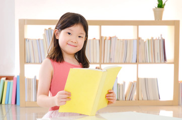 Asian child reading