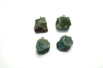 Natural green moss agate on the white background