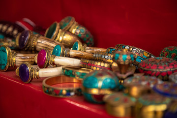 Beautiful Indian and Nepalese handmade jewelry on the street market showcase. A collection of...