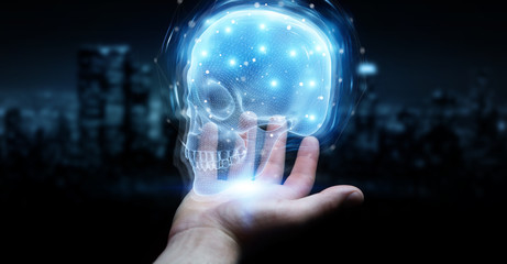 Man hand using digital x-ray skull holographic scan projection 3D rendering