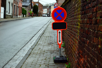 No stopping and no parking traffic sign on the city road.
