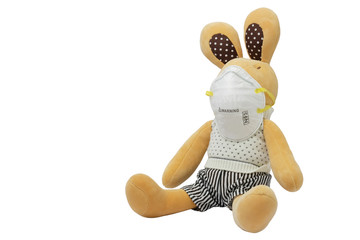 isolated bunny rabbit wearing heavy duty virus dust bacteria protective N95 face mask on white background