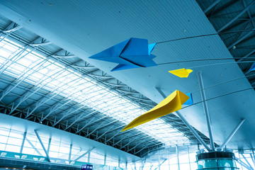 Huge paper airplanes at the airport close up