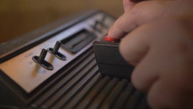 Playing With Vintage TV Video Game Console Joystick. 4K Footage